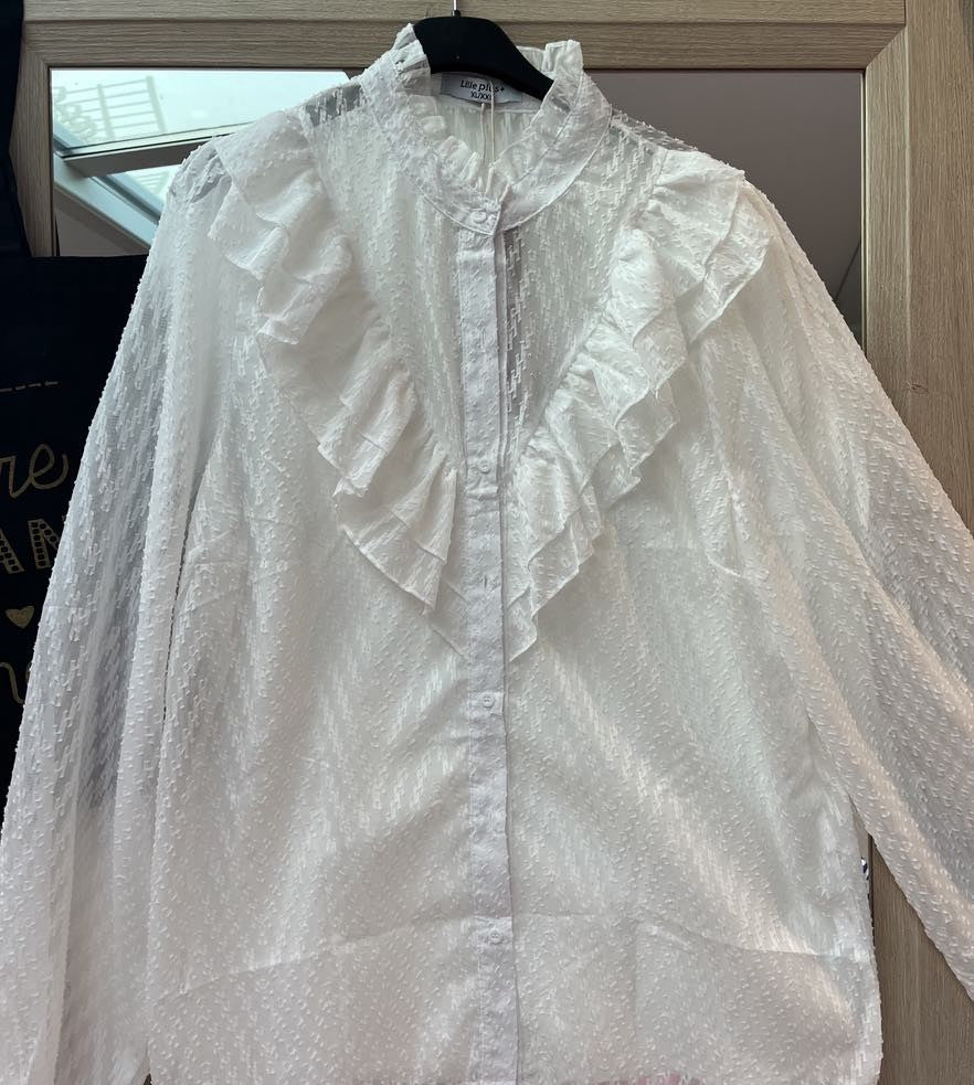 Chemisier élégant tissu transparent