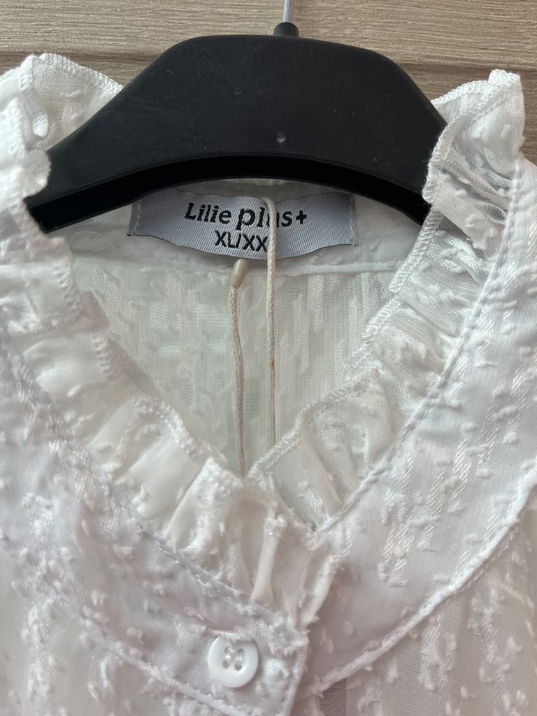 Chemisier élégant tissu transparent