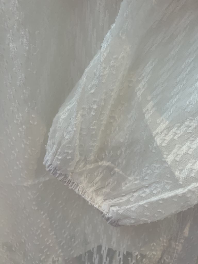 Chemisier élégant tissu transparent